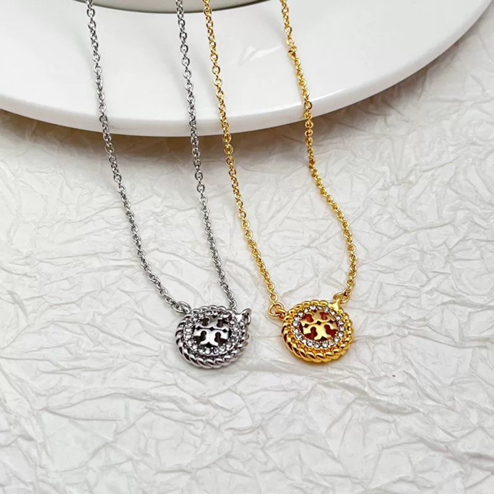 Tory Burch Gold Plated Copper Round Cutout Letter Rhinestone Necklace